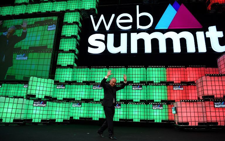 Portuguese President Marcelo Rebelo de Sousa waves after delivering the closing speech on the centre stage of the 2018 edition of the annual Web Summit