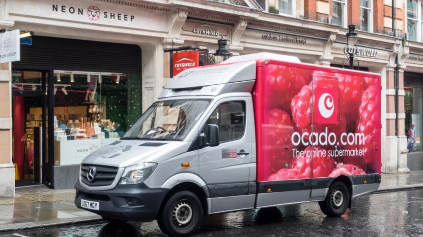 Online merchant Ocado making a delivery in the city of London.