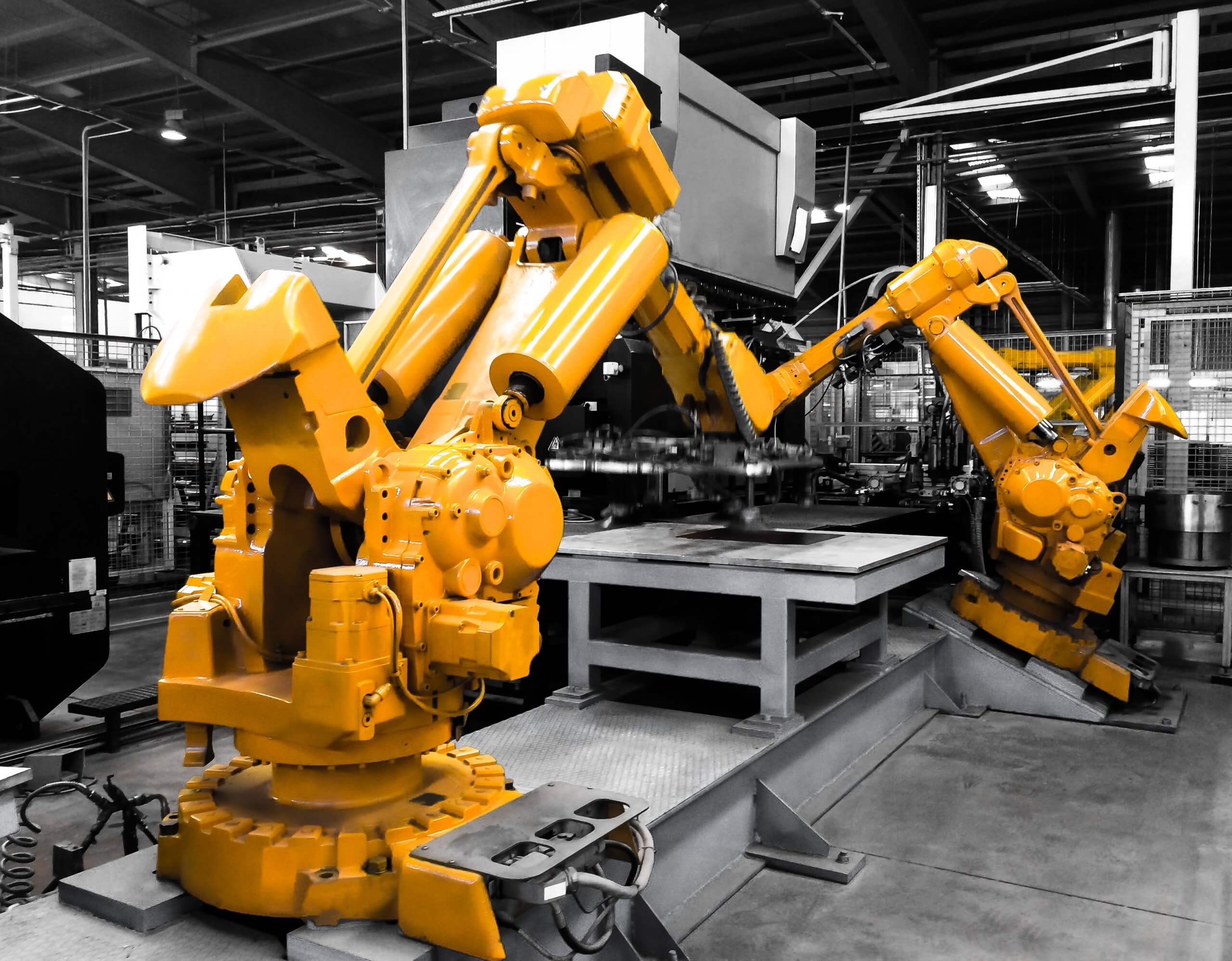 Industrial robots in production line manufacturer factory / Industrial robots in motion.